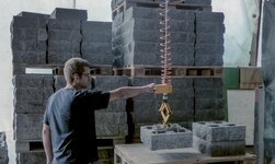 Electric chain hoist Handy with gripper lifts concrete element