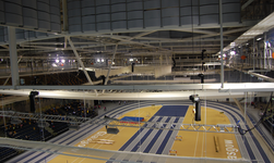 Electric chain hoists carry truss in stadium
