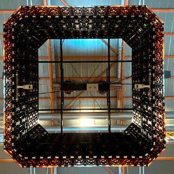 D8+ electric chain hoists hold the video cube securely above the ice surface