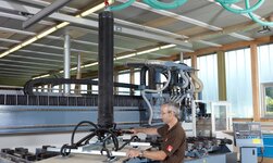 Aluminium crane system combined with tube lifter for lifting wooden panels