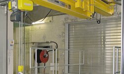 Telescopic arm provides greater reach of the crane system