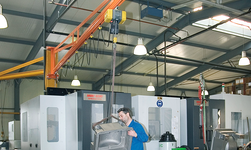 Castings are lifted with wall-mounted slewing crane