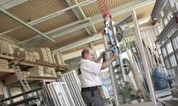 A vacuum handling system for conveying windows