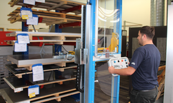 Crane system for lifting and moving metal plates